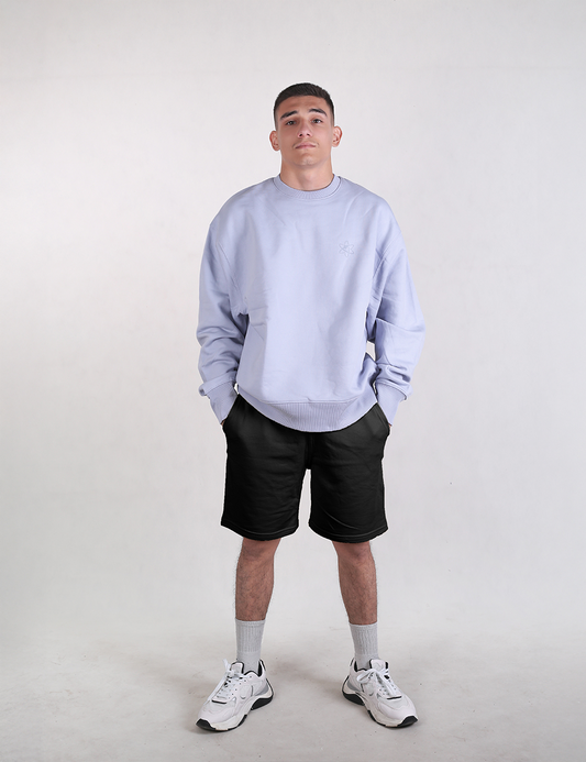 The person is wearing Rocket Science Organic Cotton Shorts.