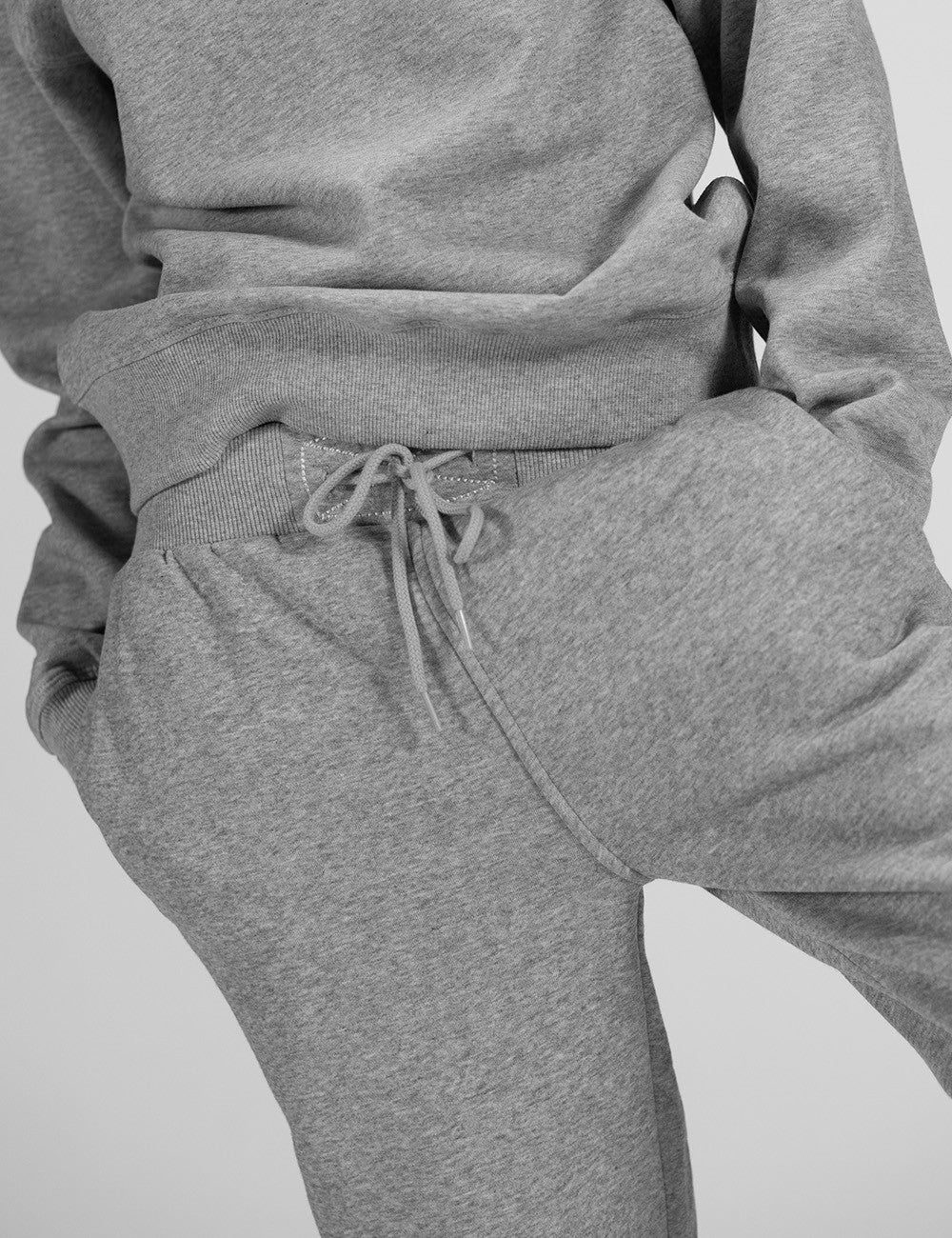 This image shows a pair of casual grey  heather Rocket Science sweatpants with an elastic drawstring waistband.