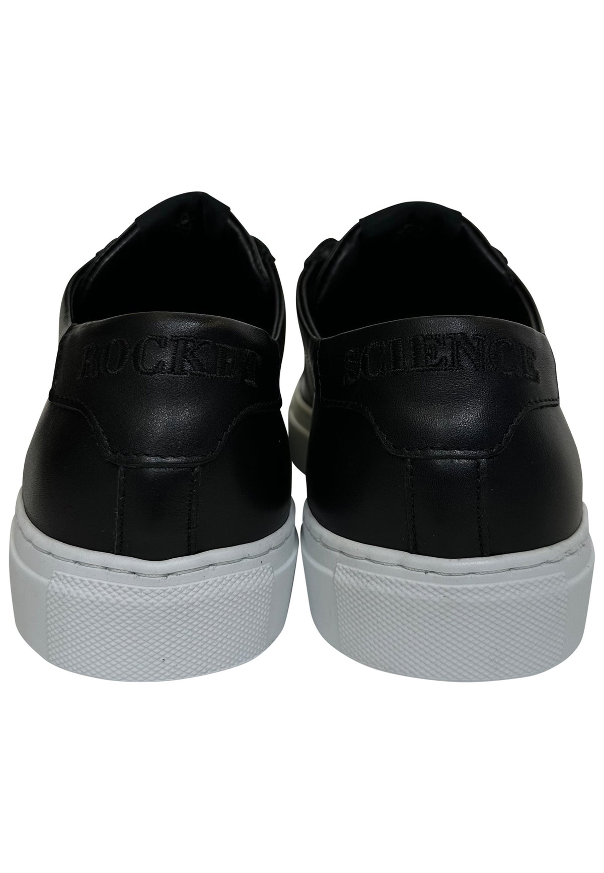 These are the black leather Moonwalker Low Sneakers by Rocket Science, featuring the brand's signature debossed lettering on the heels.
