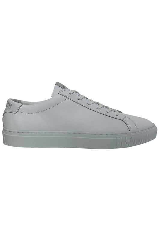 A light gray leather low-top sneaker with matching gray laces and a thick gray sole, shown in a side profile on a white background.