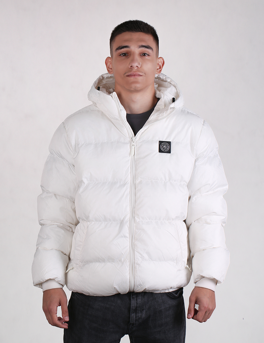 Person wearing a white puffer jacket with a brand logo on a plain background