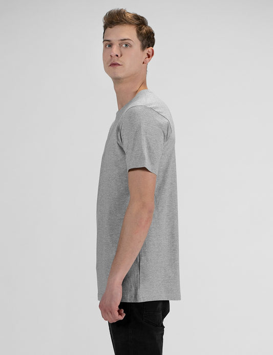 This image shows a side of a man wearing a casual grey crew-neck t-shirt, and dark denim jeans.